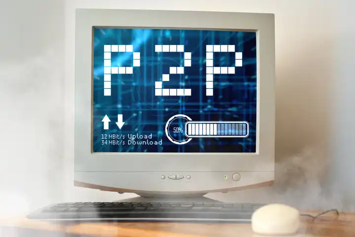 April 22, 2024: Symbolic photo file sharing. An old computer with P2P written on it is smoking with upload and download rates. PHOTOMONTAGE