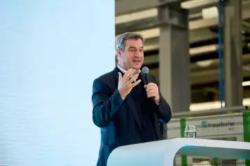 Augsburg, Bavaria, Germany - 24 April 2024: Prime Minister of Bavaria Dr. Markus Söder visits the presentation of the AI Network Augsburg. AI research hall ("Hall 43") of the University of Augsburg. Gives a speech