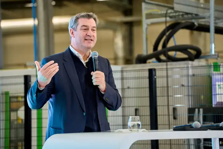 Augsburg, Bavaria, Germany - 24 April 2024: Prime Minister of Bavaria Dr. Markus Söder visits the presentation of the AI Network Augsburg. AI research hall ("Hall 43") of the University of Augsburg. Portrait shot during a speech