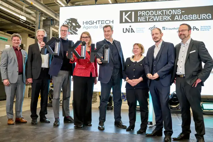 Augsburg, Bavaria, Germany - 24 April 2024: Minister President of Bavaria Dr. Markus Söder visits the presentation of the AI Network Augsburg of the University of Augsburg. With him on stage Minister of State Markus Blume and Lord Mayor Eva Weber
