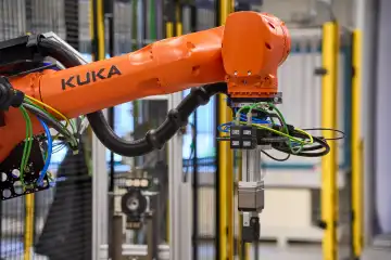 Augsburg, Bavaria, Germany - April 24, 2024: Kuka industrial robots on display in the AI research hall ("Hall 43") of the University of Augsburg