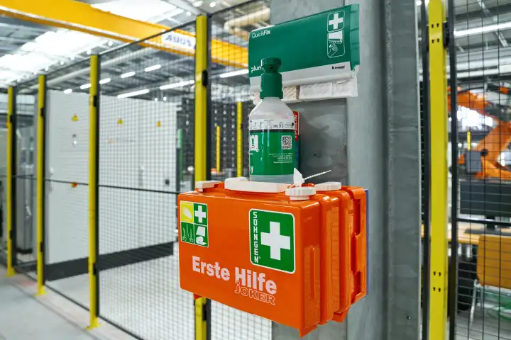 Augsburg, Bavaria, Germany - April 24, 2024: First aid kit in a factory. Symbol photo industrial accident