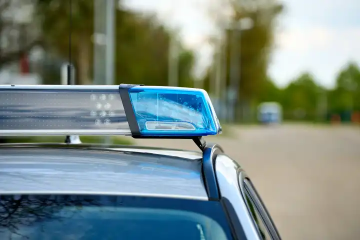 Augsburg, Bavaria, Germany - April 24, 2024: Blue light on a police car