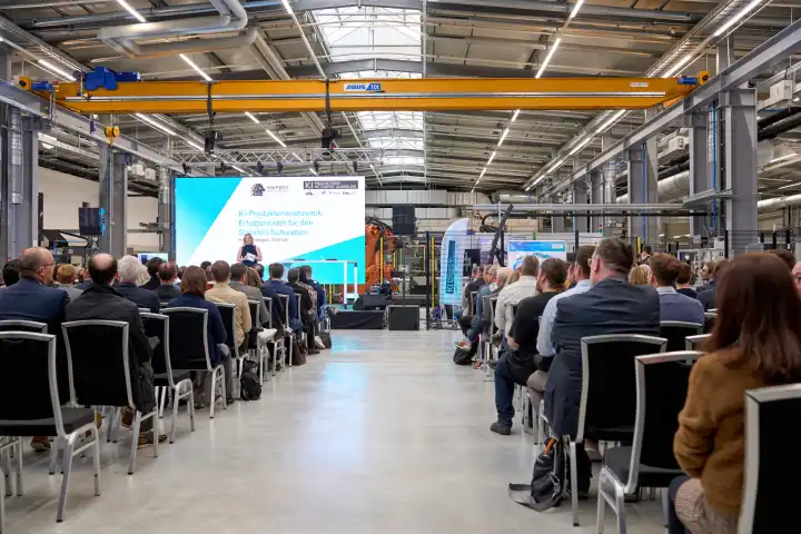 Augsburg, Bavaria, Germany - April 24, 2024: Presentation of the Augsburg AI Network "A model of success for Swabia" in the AI research hall "Halle 43" at the University of Augsburg