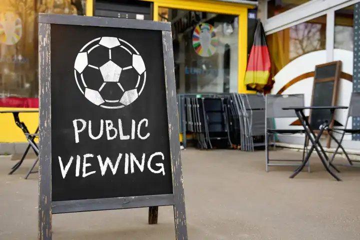 25 April 2024: Symbolic photo Public Viewing of the UEFA EURO 2024 European Football Championship, sign in front of a restaurant with the inscription: Public Viewing. PHOTOMONTAGE