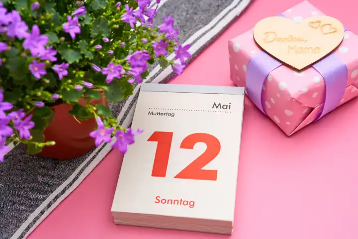 Augsburg, Bavaria, Germany - April 25, 2024: Mother's Day, on May 12 Calendar page with Mother's Day gift and flowers