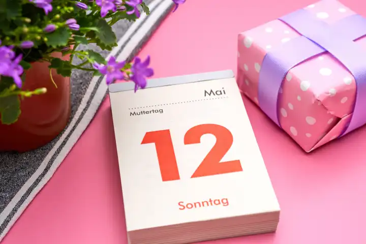 Augsburg, Bavaria, Germany - April 25, 2024: Mother's Day, on May 12 Calendar page with Mother's Day gift and flowers