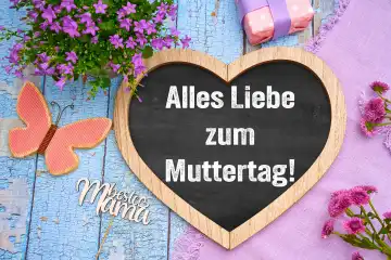 Augsburg, Bavaria, Germany - April 25, 2024: All the best for Mother's Day! Greeting for Mother's Day, writing on a heart with chalkboard. PHOTOMONTAGE