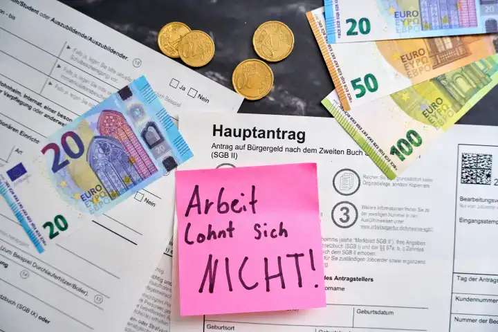 Augsburg, Bavaria, Germany - April 25, 2024: Work is NOT worth it! Note on a citizen's allowance application from the employment agency