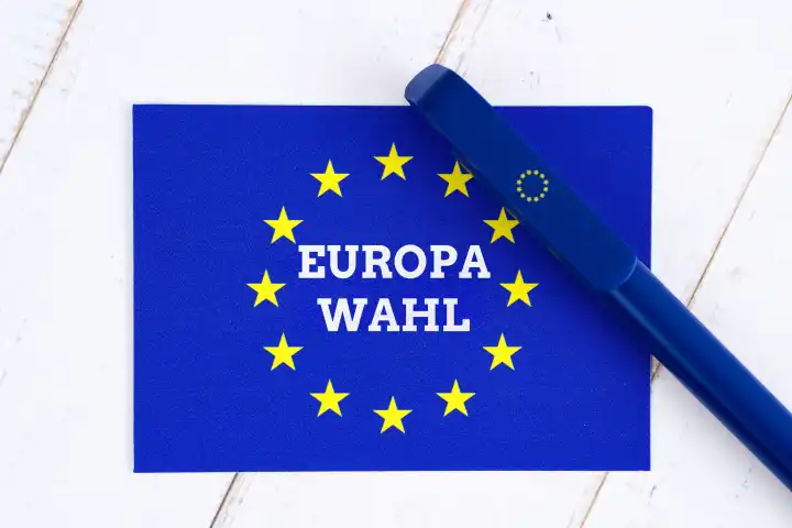 28 April 2024: Symbolic photo European election, EU flag with EU ballpoint pen and the lettering: Europa Wahl. PHOTOMONTAGE