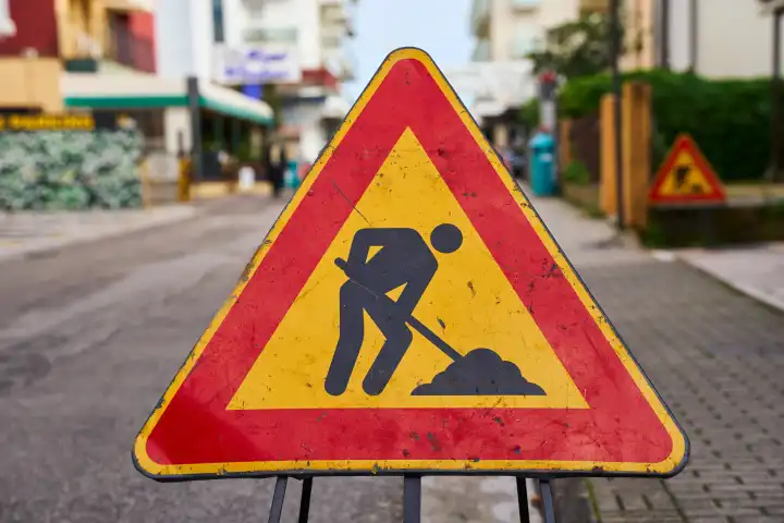 Lido di Jesolo, Italy - 2 May 2024: Warning sign on a road in Italy, construction site