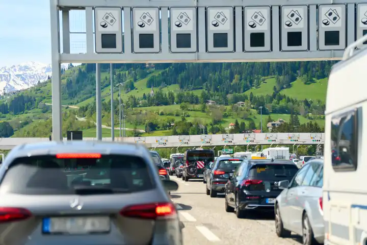 Brenner, highway, Italy - 11 May 2024: Traffic jam at the Brenner highway toll booth between Italy and Austria during the vacation season. Toll station with many vehicles