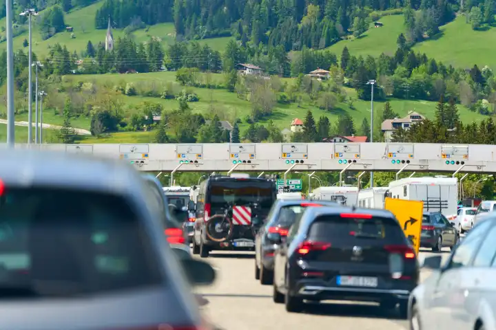 Brenner, highway, Italy - 11 May 2024: Traffic jam at the Brenner highway toll booth between Italy and Austria during the vacation season. Toll station with many vehicles