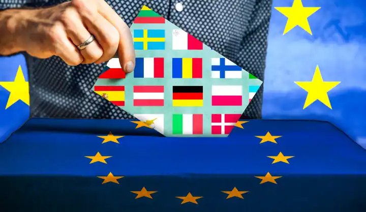 Europawahl 2024, Ein Mann wirft einen Stimmzettel mit verschiedenen Länderflaggen wie Italien, Schweden, Spanien und Deutschland in eine Wahlurne mit EU Flagge. FOTOMONTAGE