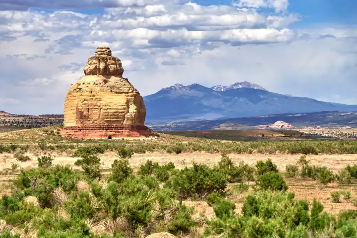 Highway 191, Utah, United States of America - 7 June 2024: Church Rock, an impressive sandstone formation in Utah near U.S. Route 191 and the entrance to Canyonlands National Park, reaches 1881 meters and forms a spectacular backdrop with the Abajo Mountains