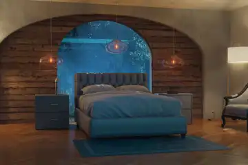 Schlafzimmer mit Fensterbogen und einem gemütlichen Bett neben den Hängelampen