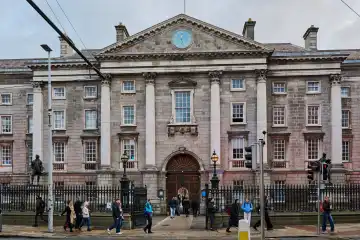 Dublin, Ireland - Dec 21, 2023: entrance of the famous Trinity College of Dublin, Ireland