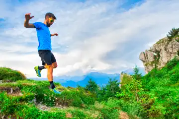 Green mountain nature race. A sporty man