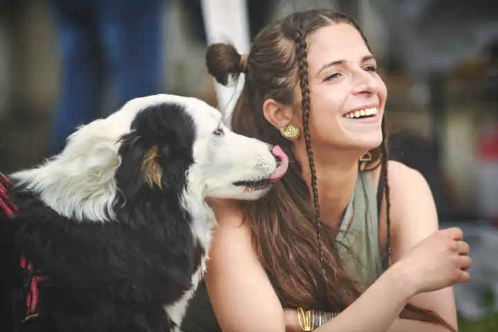 Caucasian girl with her inseparable Australian shepherd dog