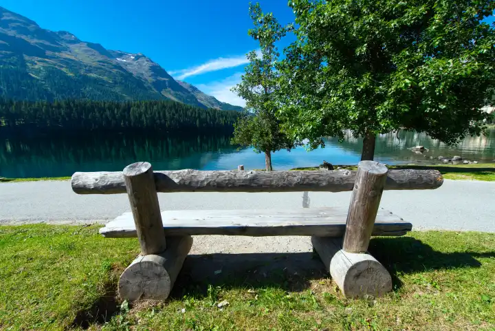 Bench on the mountain lake