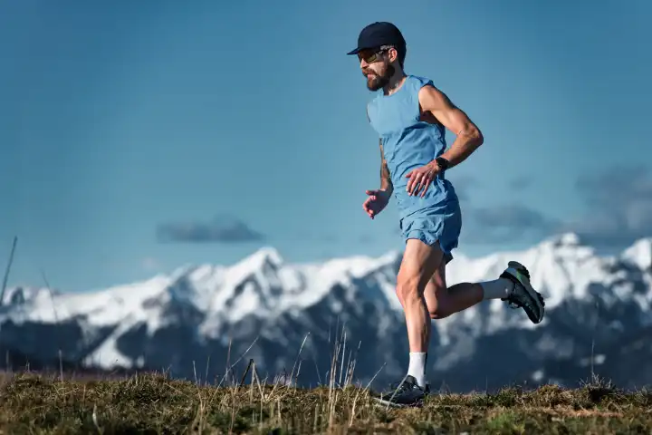 Man trains running in the mountains alone