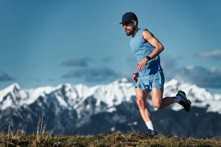 Mountain running a man training alone
