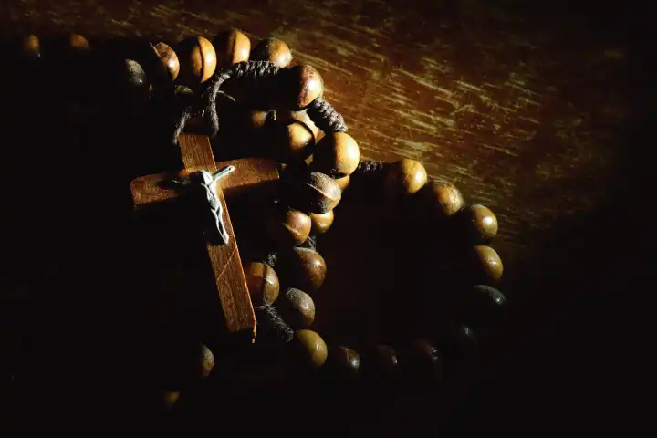 A rosary crown on wooden table