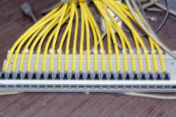 Background, detail, networking: Bar with numerous connected network cables