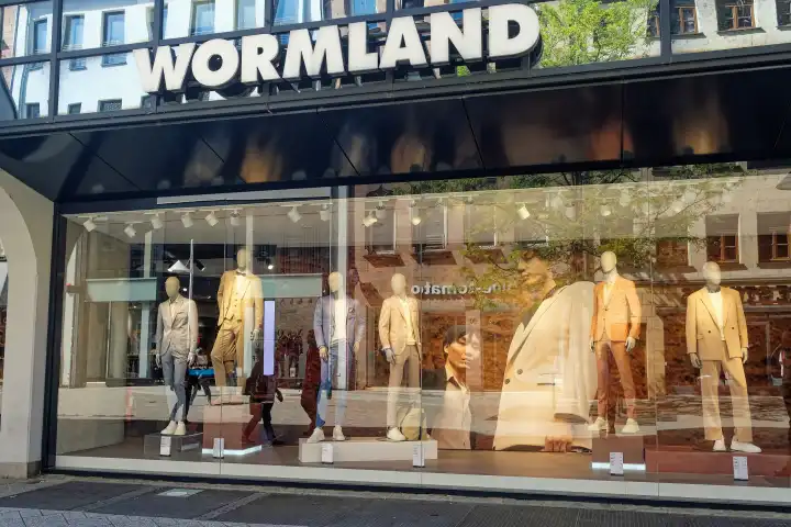 Lettering of the fashion retailer Wormland on the facade of a store in Nuremberg, Bavaria, Germany