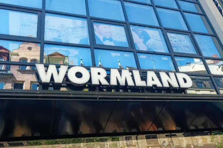 Lettering of the fashion retailer Wormland on the facade of a store in Nuremberg, Bavaria, Germany