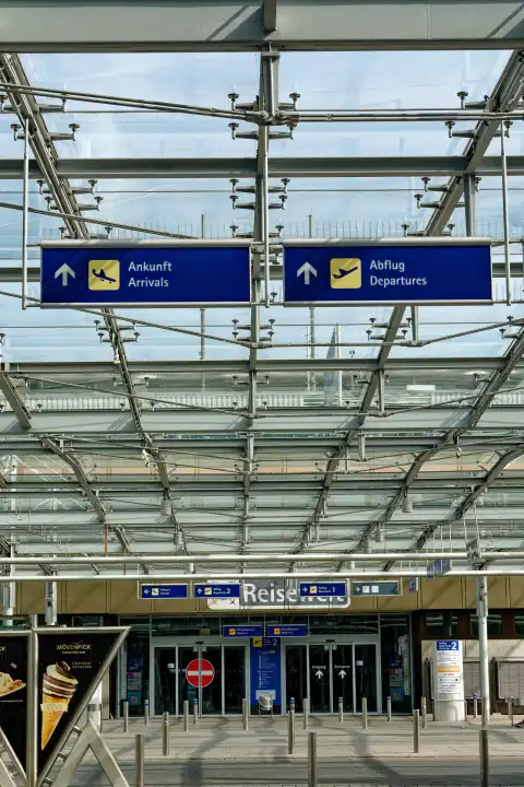 Arrival and departure signs at the airport