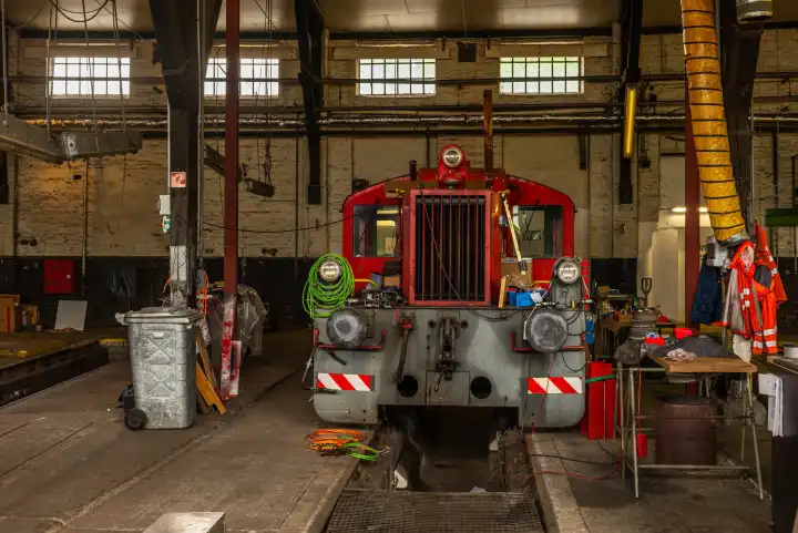 Old train for repair in the service hall