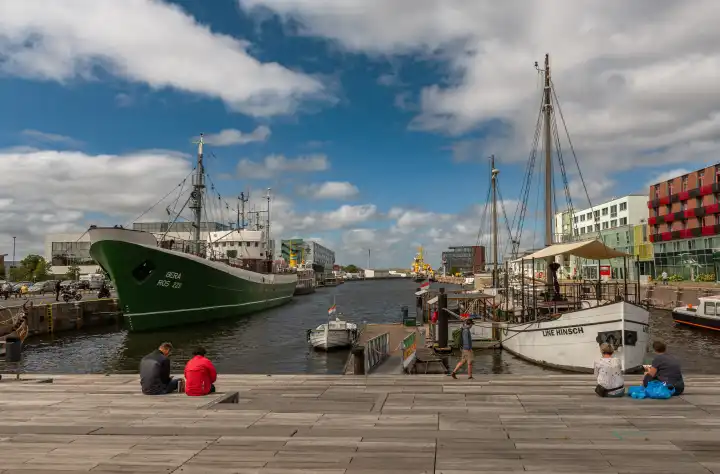 Tourists in the newly designed maritime district of Harbor worlds, Bremerhaven, Bremen