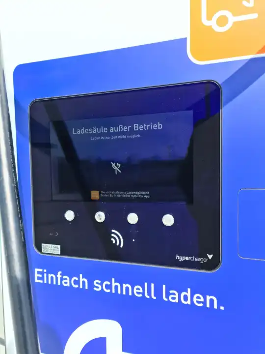 Bordesholm, Germany - 07. April 2023: An electric car charging station shows the german text for our of order