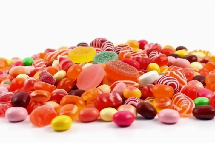A lot of candy on a white background created with generative AI technology