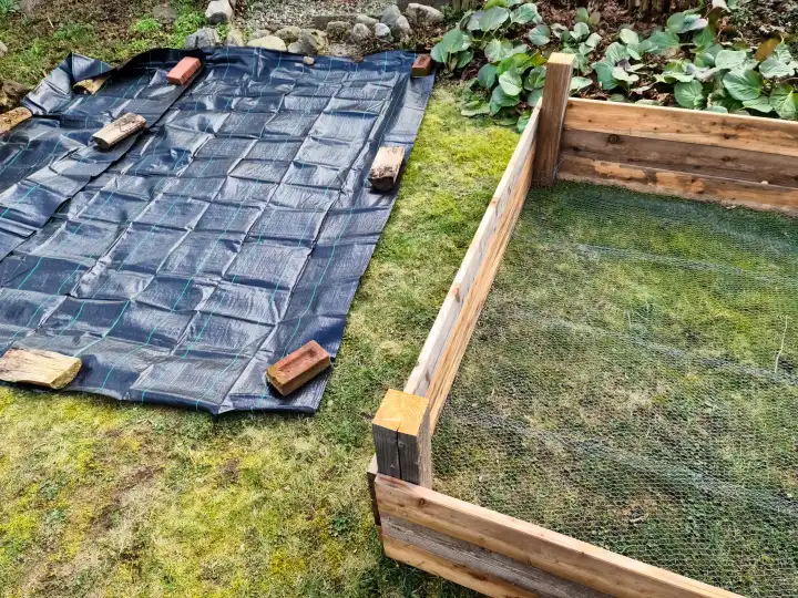 A raised bed for the garden that is currently being assembled