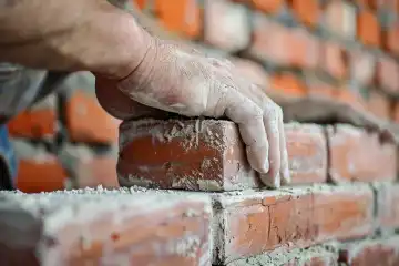 A mason building a brick wall, generated with AI