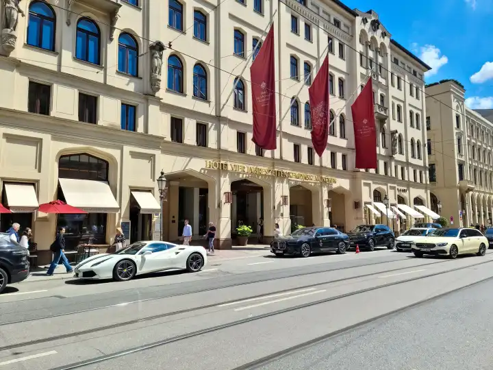 Munich, Germany - 22 June 2024: The Vier Jahreszeiten Kempinski luxury hotel in the centre of Munich in sunny weather