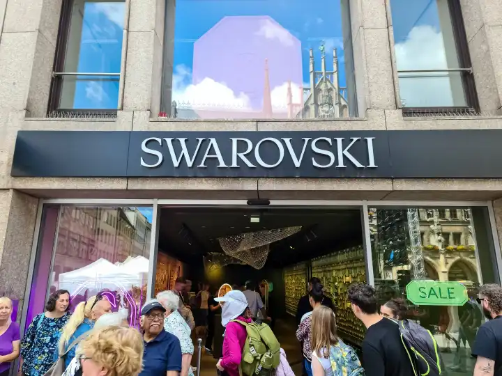 Munich, Germany - 22 June 2024: The entrance area of a Swarowski brand shop in Munich city centre
