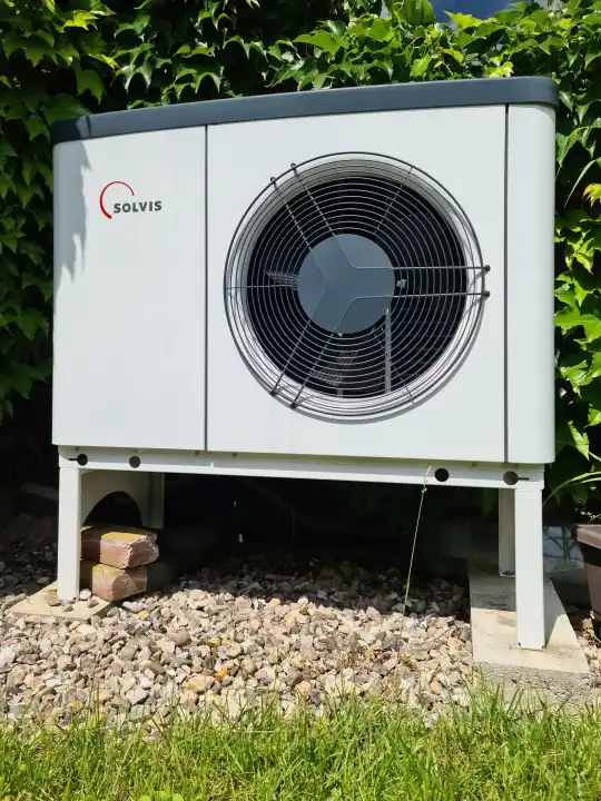 Kiel, Germany - 26 June 2024: A new Solvis heat pump in operation in front of a detached house