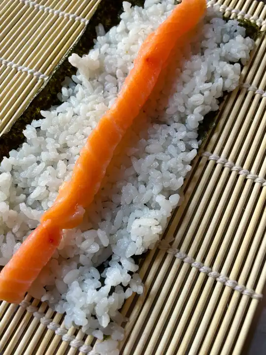 Making sushi and rolls at . Close Up 