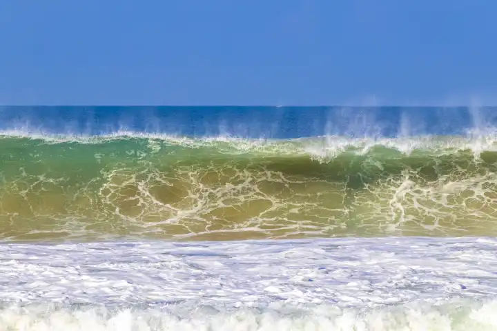 Extremely huge big surfer waves on the beach in Zicatela Puerto Escondido Oaxaca Mexico.