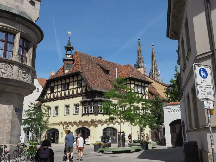 REGENSBURG, GERMANY - CIRCA JUNE 2022: People in the city centre