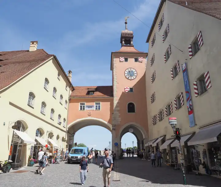 REGENSBURG, GERMANY - CIRCA JUNE 2022: People in the city centre