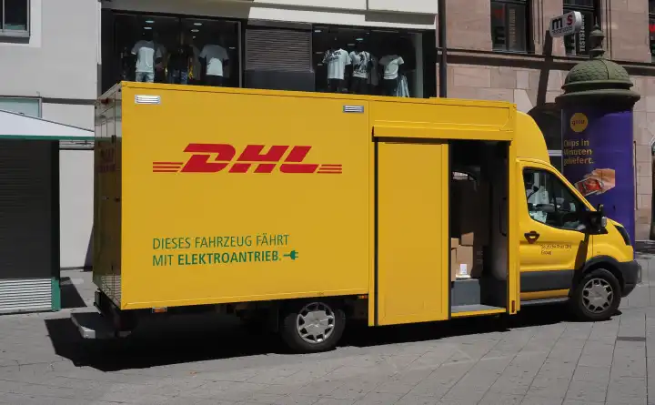 NUERNBERG, GERMANY - CIRCA JUNE 2022: DHL courier van