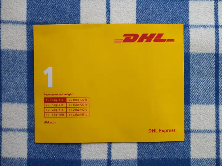 BONN, GERMANY - OCTOBER 25, 2023: DHL Express envelope