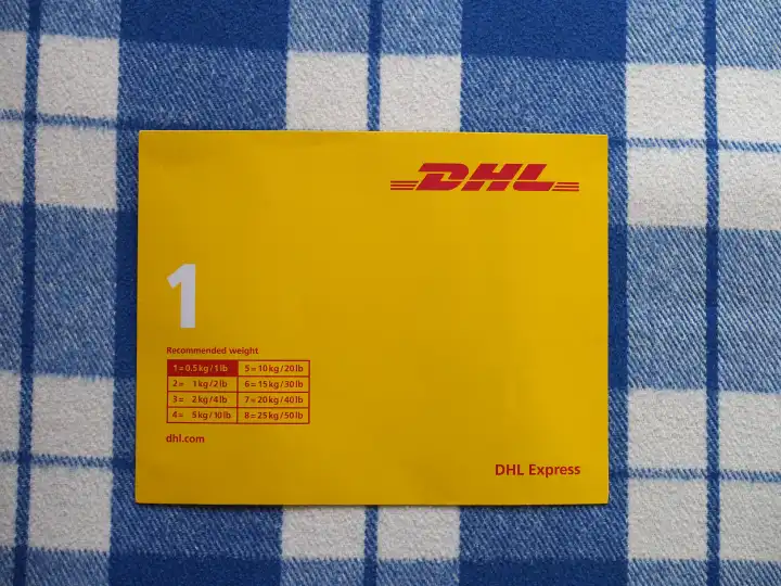 BONN, GERMANY - OCTOBER 25, 2023: DHL Express envelope