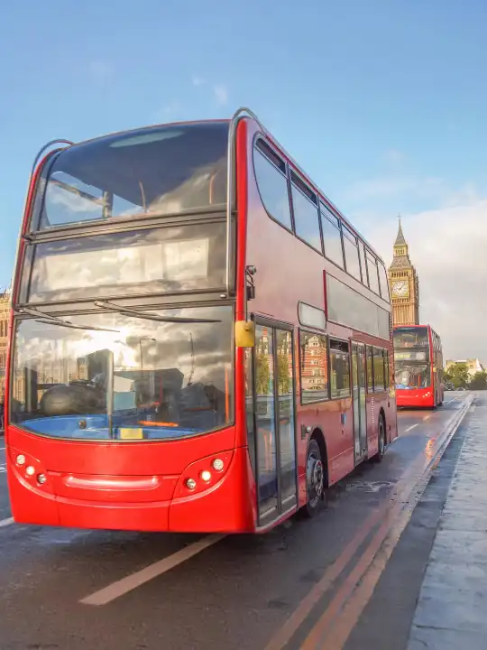 double decker red bus on Westminster Bridge in London, UK