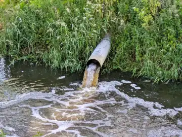 Pollution outflow pipe into river